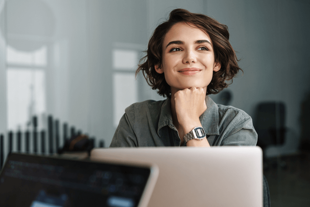 young female employee smiling in the workplace