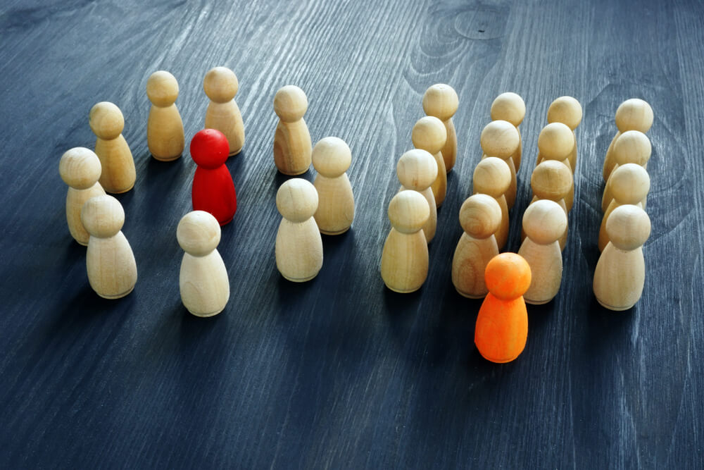 different management styles concept in wooden figures